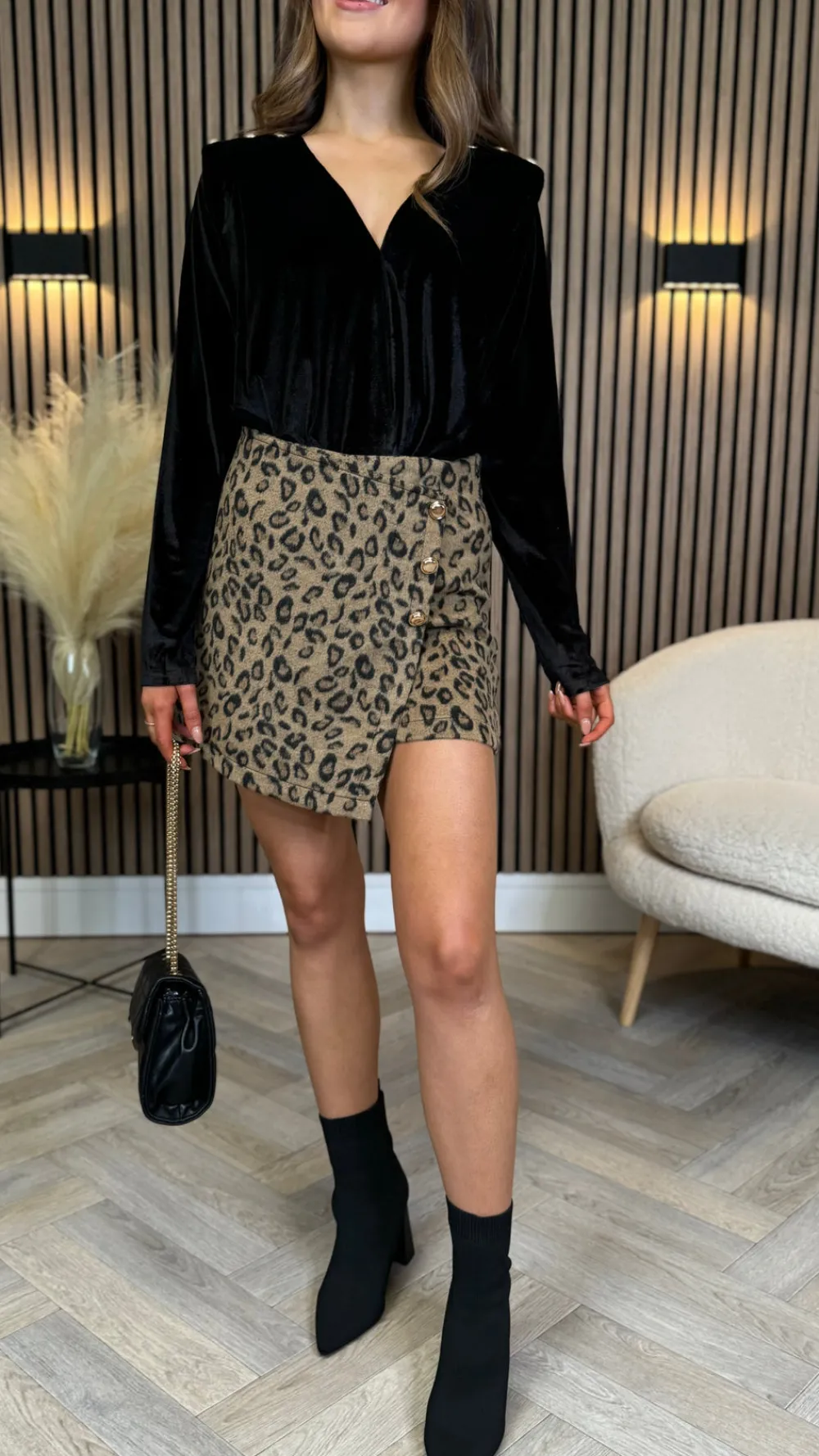 bexley_black_velvet_finis_2.webp UNIKA Tops^Bexley Black Velvet Finish Button Detail Bodysuit
