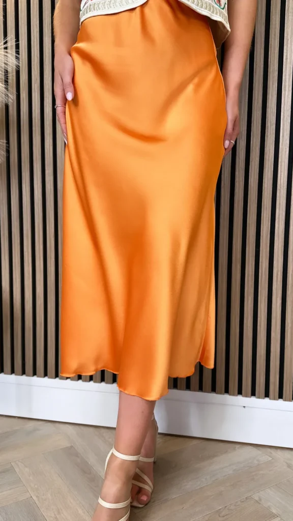 COPPEROSE Skirts & Shorts^Yaella Orange Midi Skirt